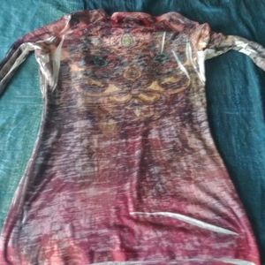 Sheer distressed long sleeve tee.